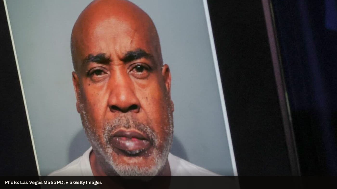 Duane "Keffe D" Davis's actual booking photo, shown on screen at a Las Vegas Metro PD press conference.