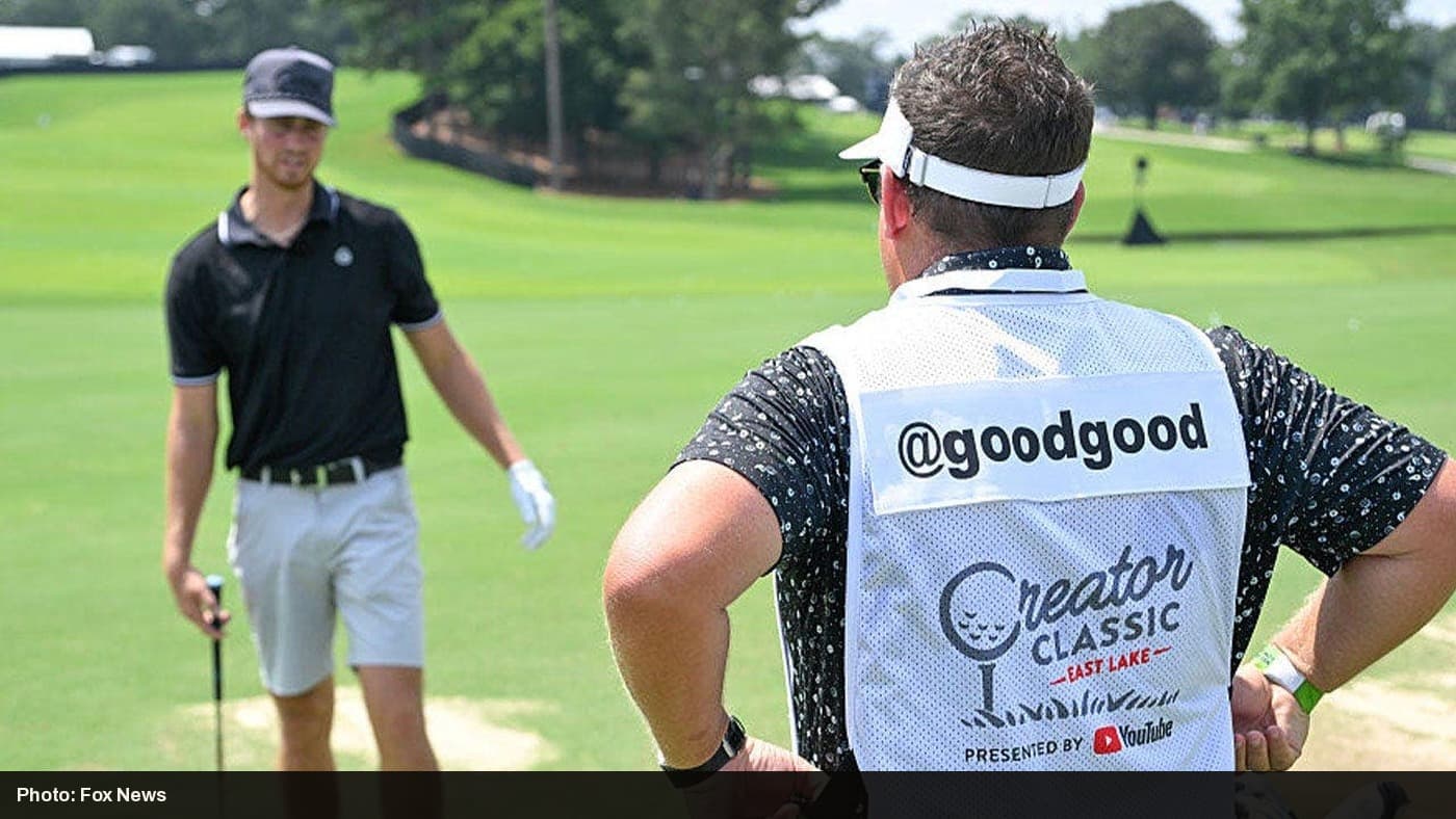 A caddie wears a Good Good branded bib at the Creator Classic golf event, days before the company's CEO and president resigned.