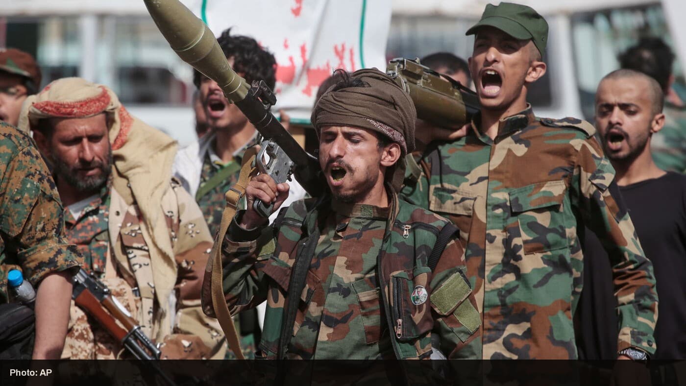 Houthi fighters marching during a mobilization campaign in Sanaa, Yemen.