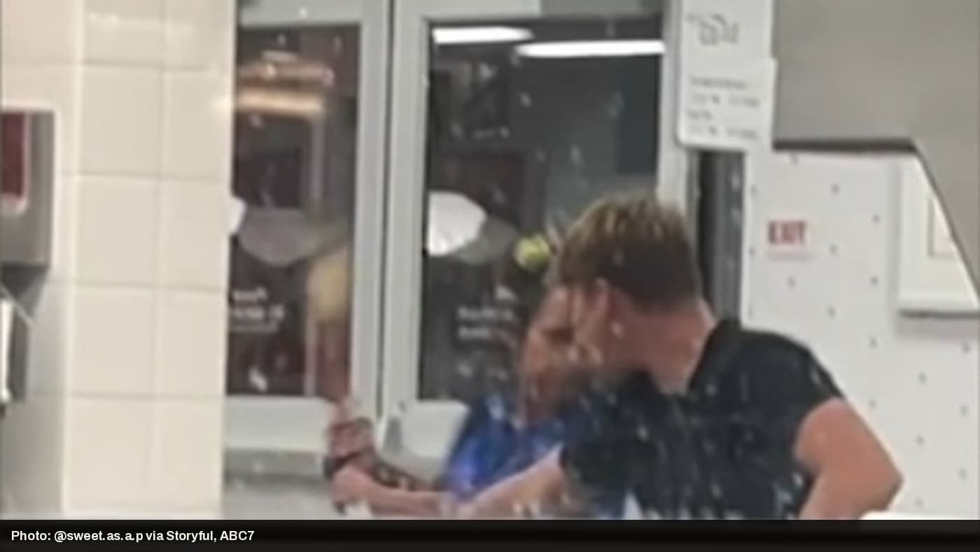 A man confronts a woman inside a Lake Elsinore In-N-Out restaurant during a viral altercation.