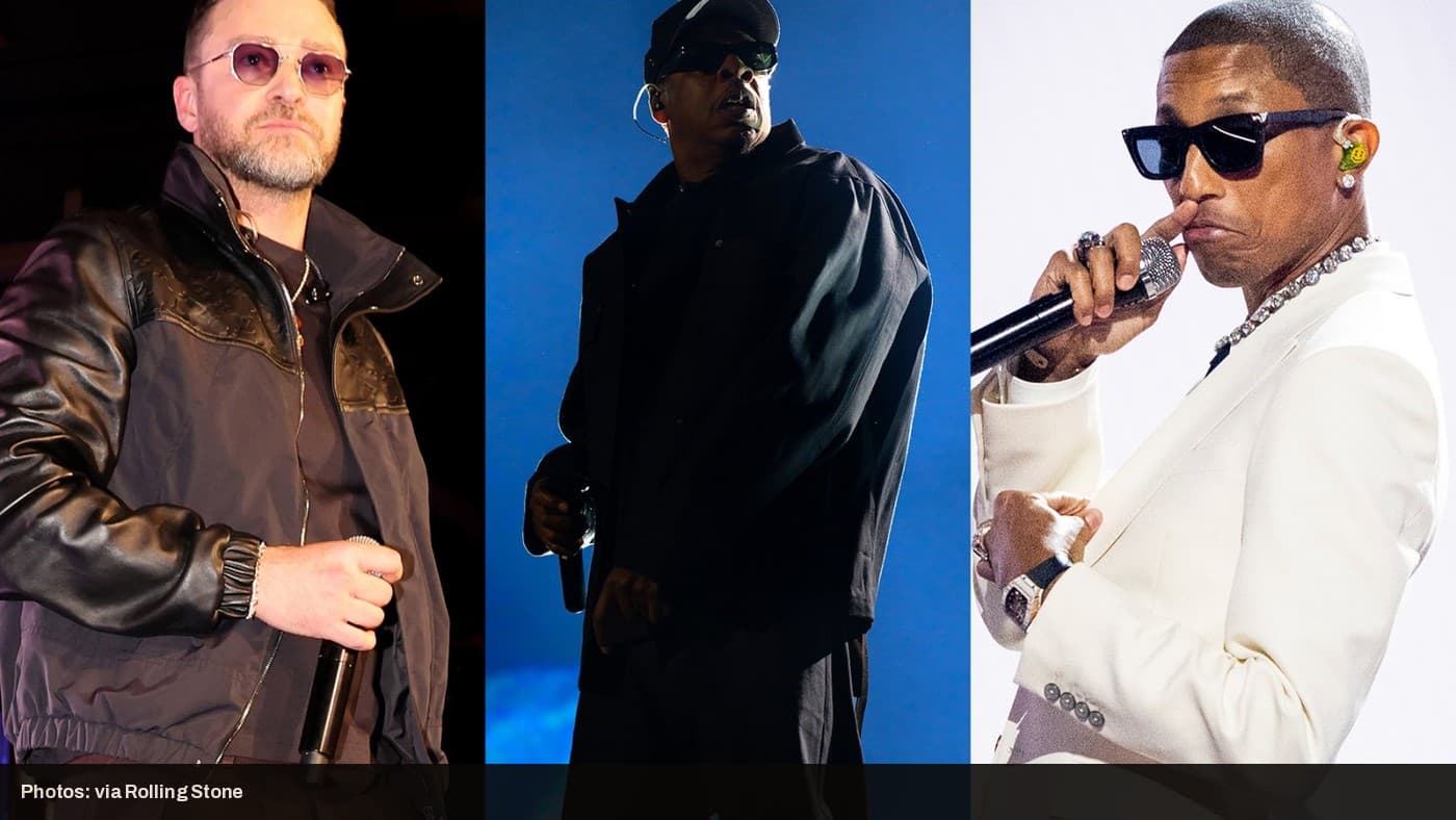 Justin Timberlake, Jay-Z, and Pharrell Williams performing on stage in Paris.