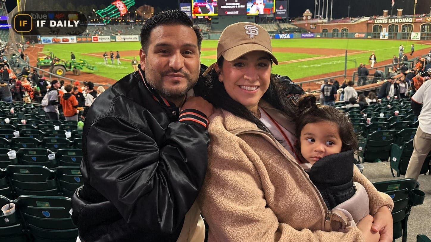 Erika and Ramses at Oracle Park with their daughter Anastasia
