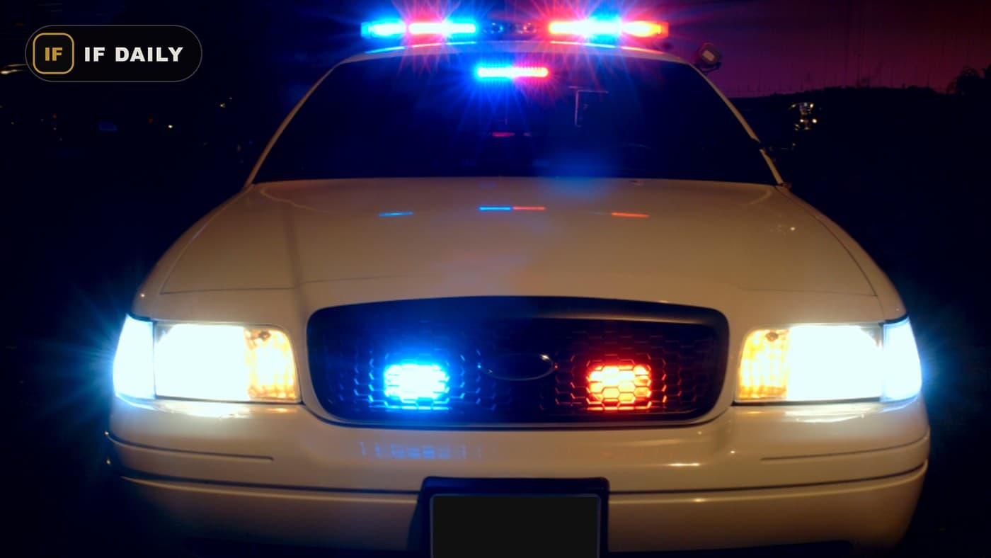 Police car with emergency lights activated