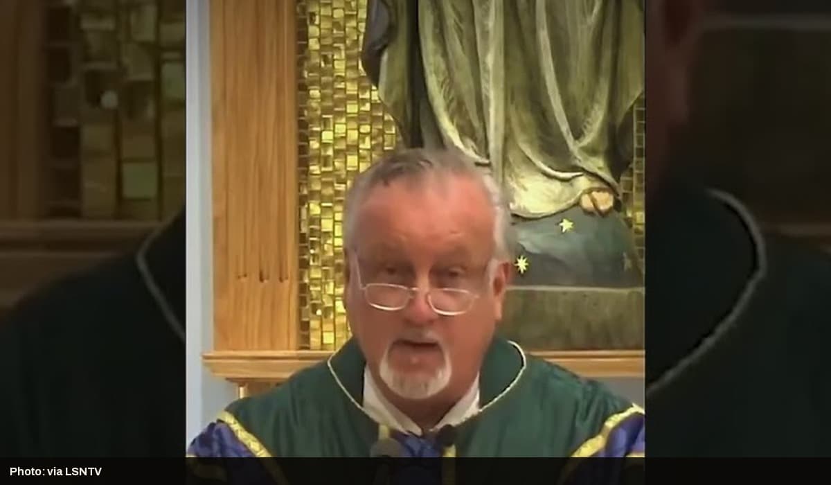 Father Dan Reehil delivers the homily about Lindsay Clancy's supporters at St. Catherine of Siena Catholic Church.