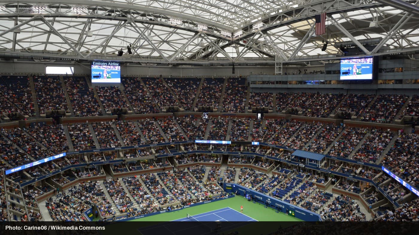 Arthur Ashe Stadium at the US Open, packed for a match.