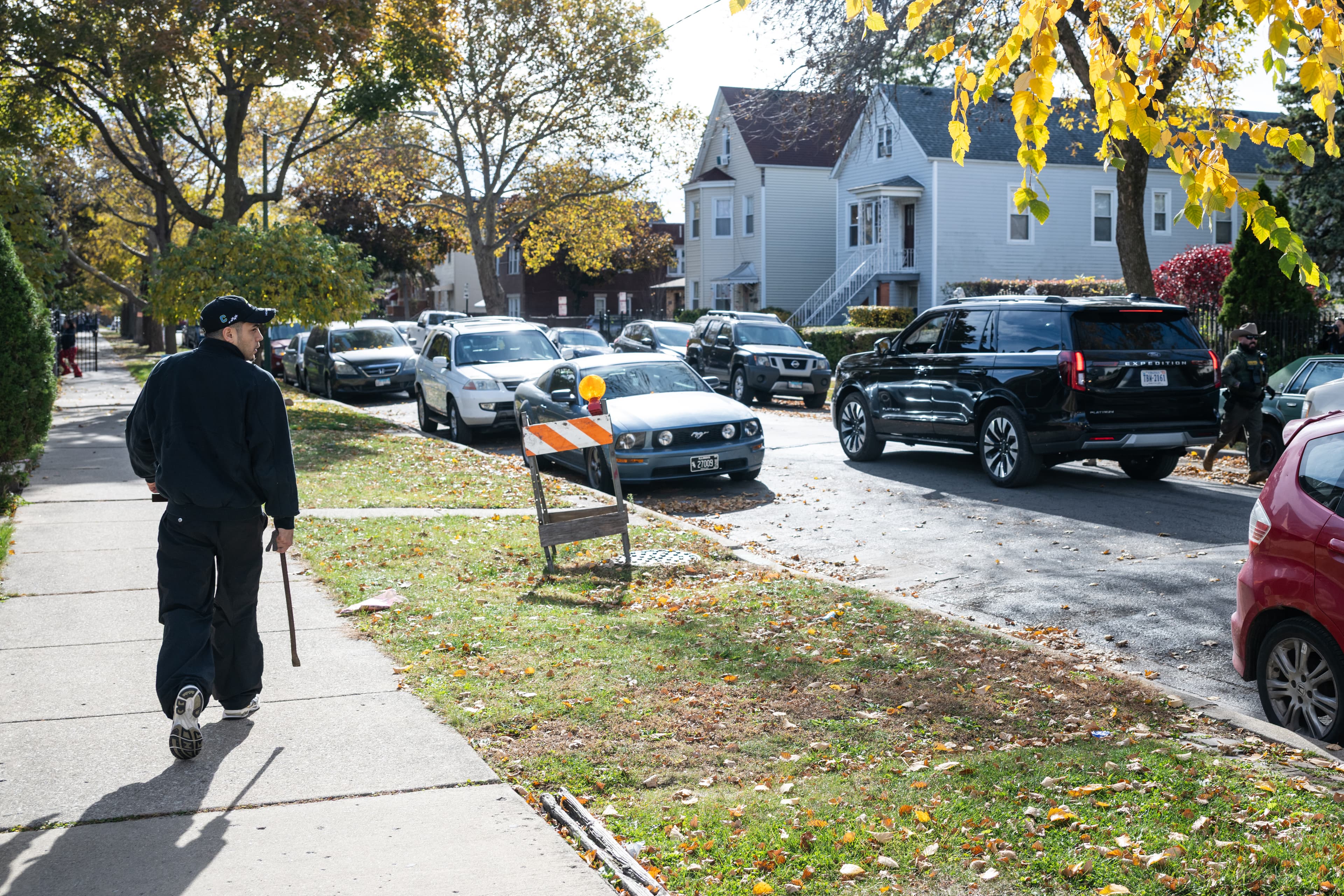 An ICE immigration enforcement operation in a residential Chicago neighborhood (file photo, unrelated to this case)