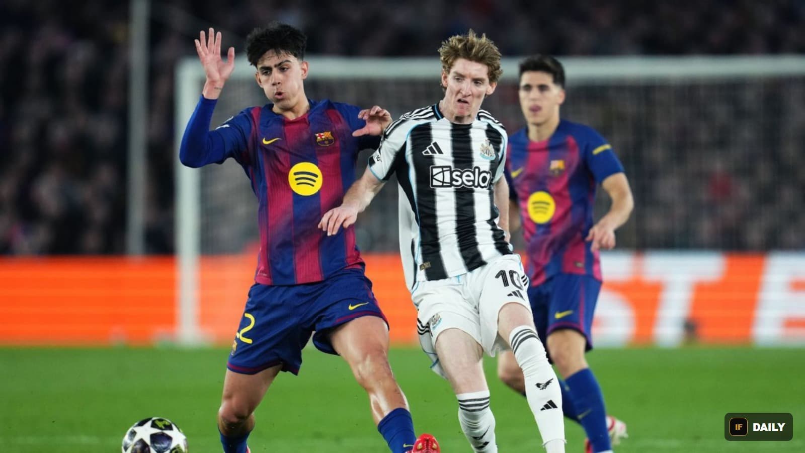 Anthony Gordon playing for Newcastle United against Barcelona defenders in a Champions League match