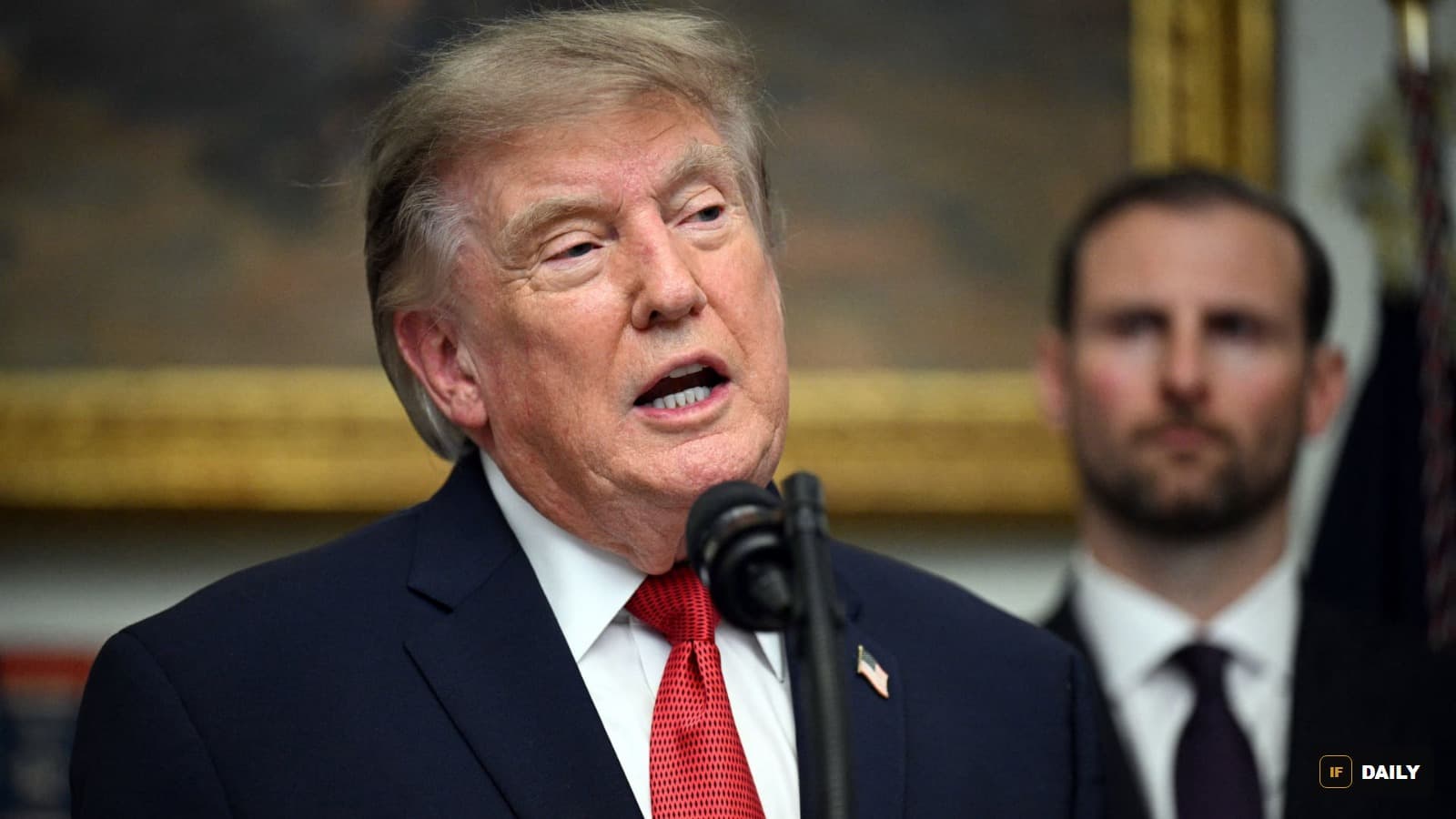 President Trump speaking at a podium at the White House