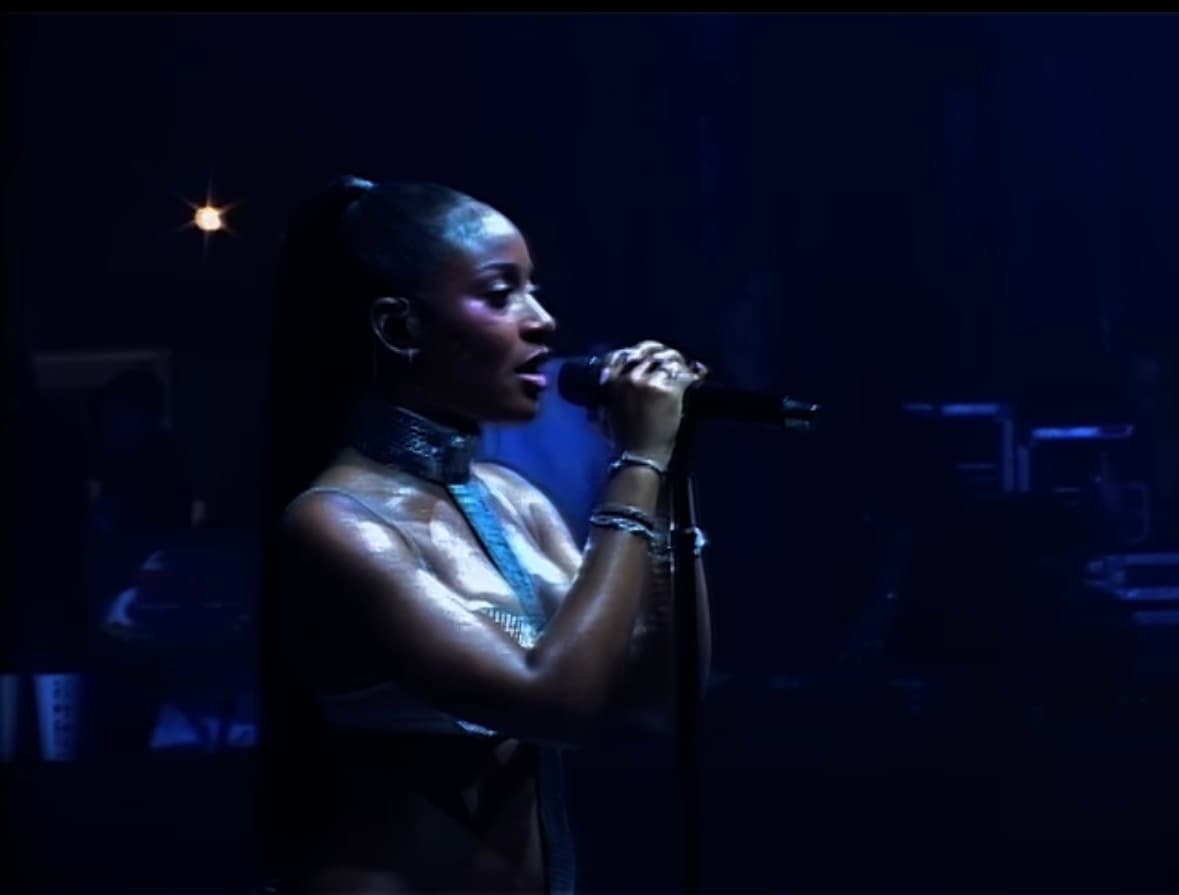 Ayra Starr performing “Heaven Baby” featuring ZAYN live on stage in London.