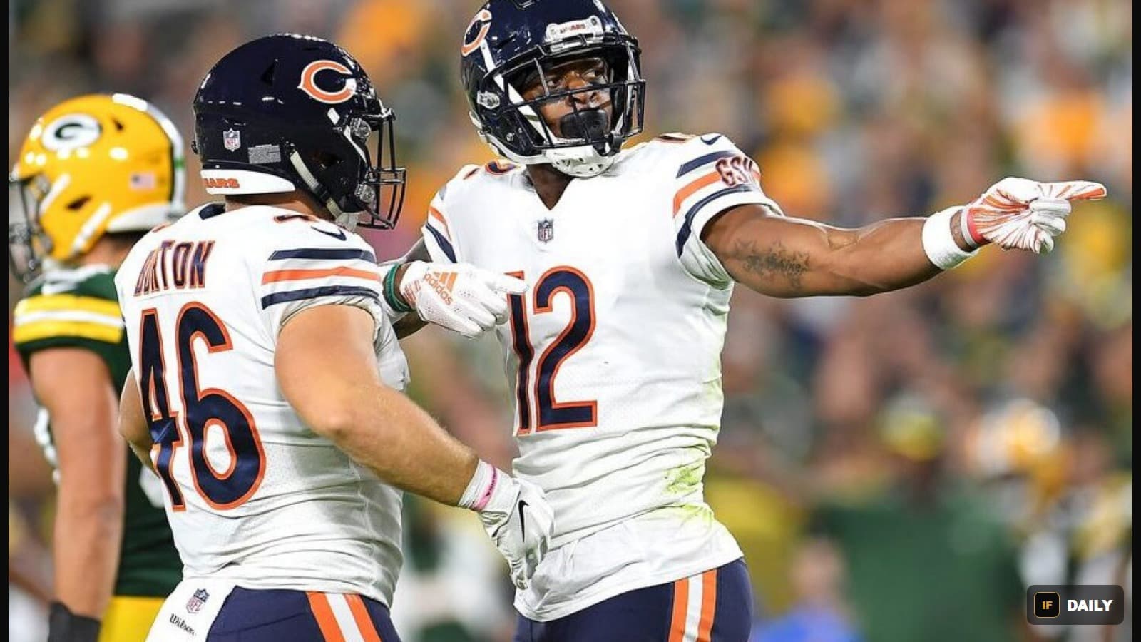 Allen Robinson in a Chicago Bears jersey pointing downfield with a teammate on the field