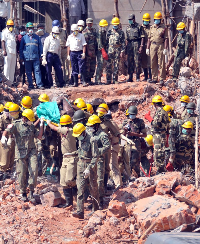 NDRF personnel conduct a rescue operation at the site of a building collapse in India (file photo, Bellary, Karnataka)