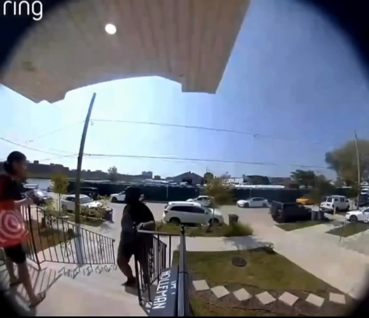 A woman is seen arriving at a destination while a man appears to follow behind her in footage circulating online. Credit: @shadymentol on Threads.
