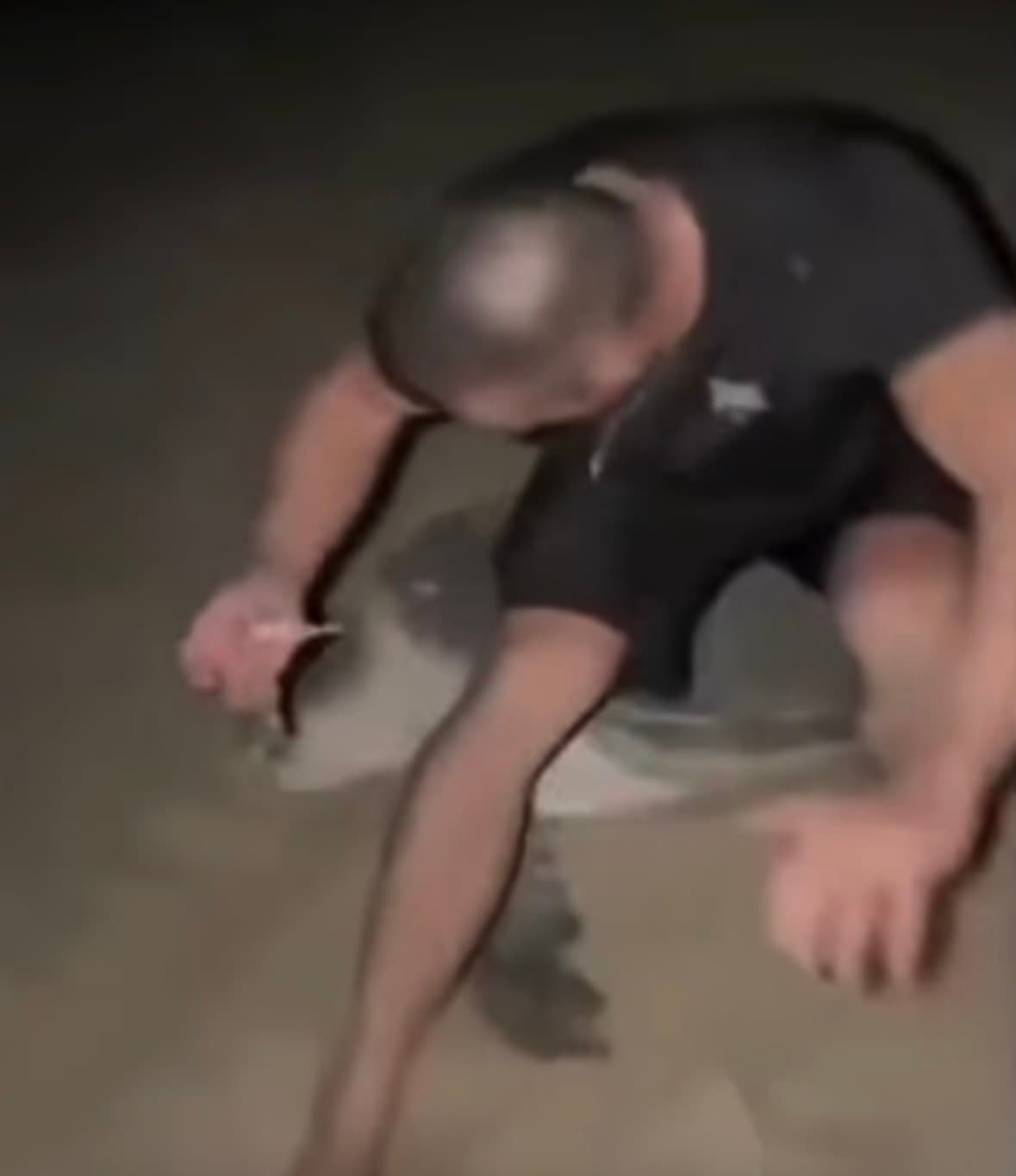 Ukrainian fitness influencer Vadym Oleynik sitting on a protected sea turtle in Oman sparking viral backlash