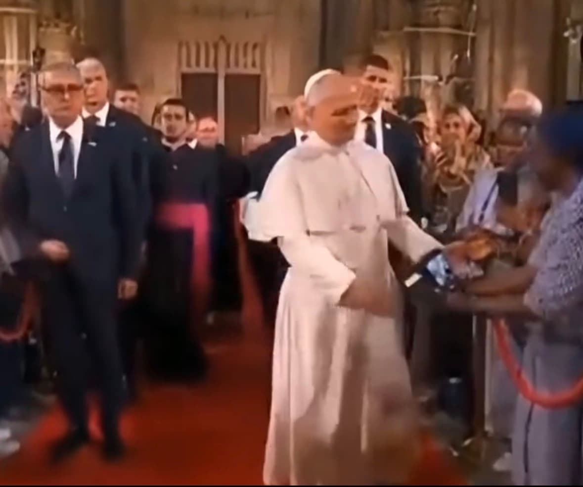 Pope Leo XIV greeting clergy at St Stephen Cathedral in Metz France during apostolic visit
