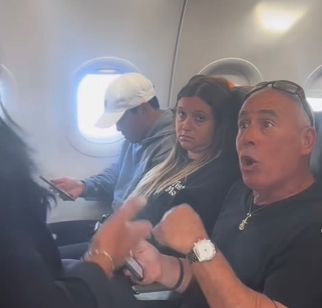 Santiago Daza inside a Delta Air Lines flight during the seat dispute that ended with him being removed from the aircraft.