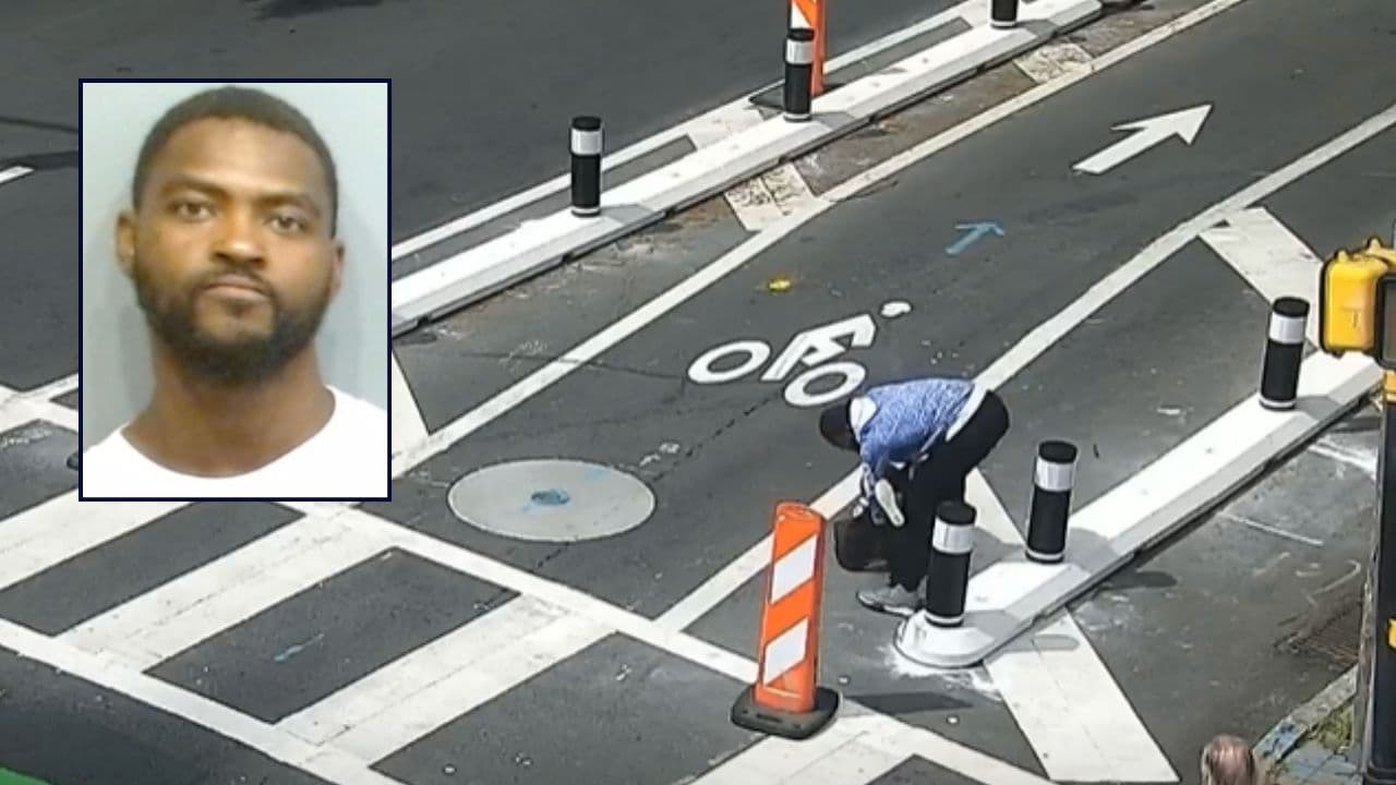 Surveillance footage shows a robbery suspect following a woman through an Atlanta crosswalk before an alleged attack.