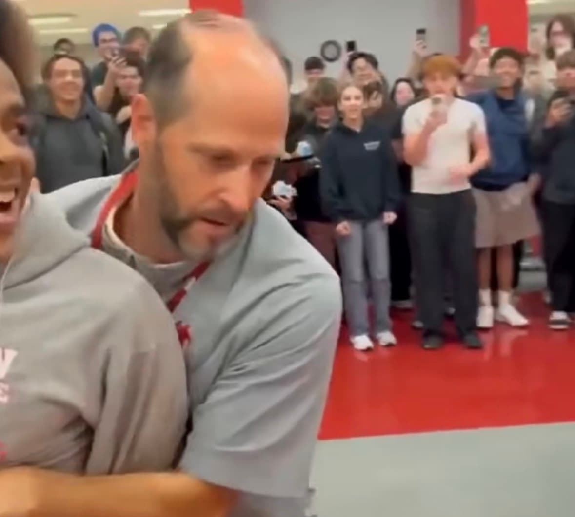 Teacher Joshua Filiatrault reacts to a surprise birthday celebration organised by his students at Johnston Heights Secondary School in Surrey, Canada.